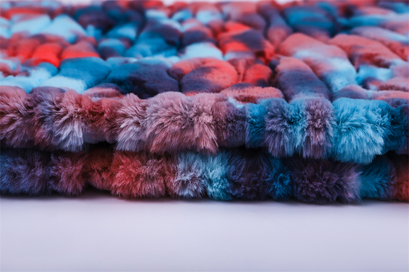 Tie dyed embossed artificial fur