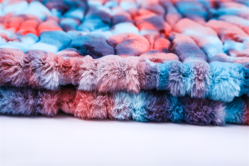 Tie dyed embossed artificial fur