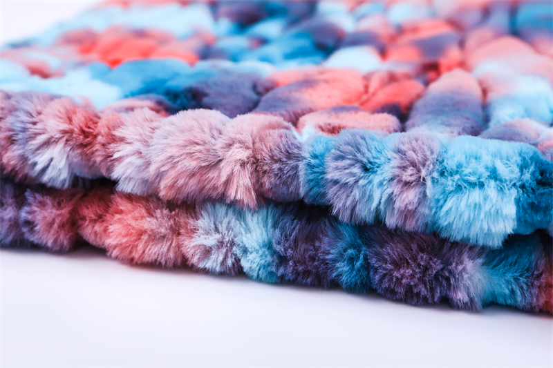 Tie dyed embossed artificial fur