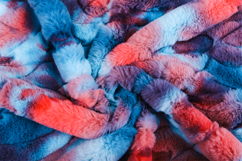 Tie dyed embossed artificial fur