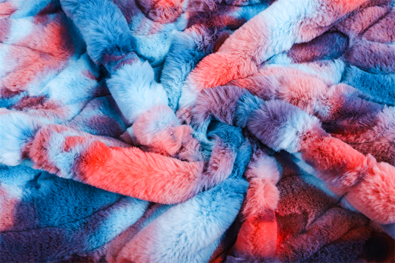 Tie dyed embossed artificial fur