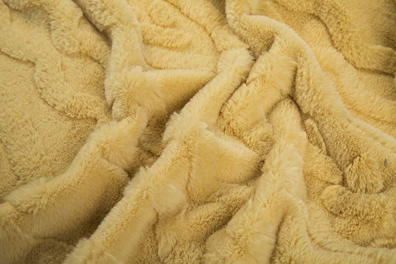 Weft knitted jacquard artificial fur