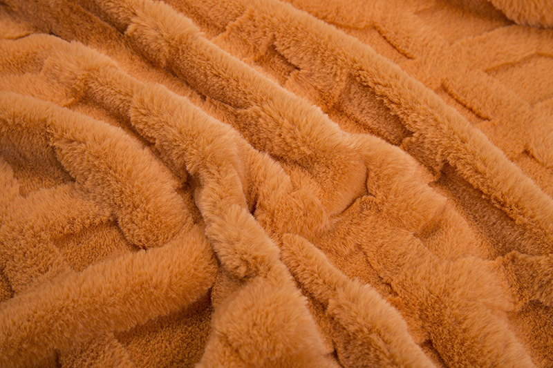 Weft knitted jacquard artificial fur