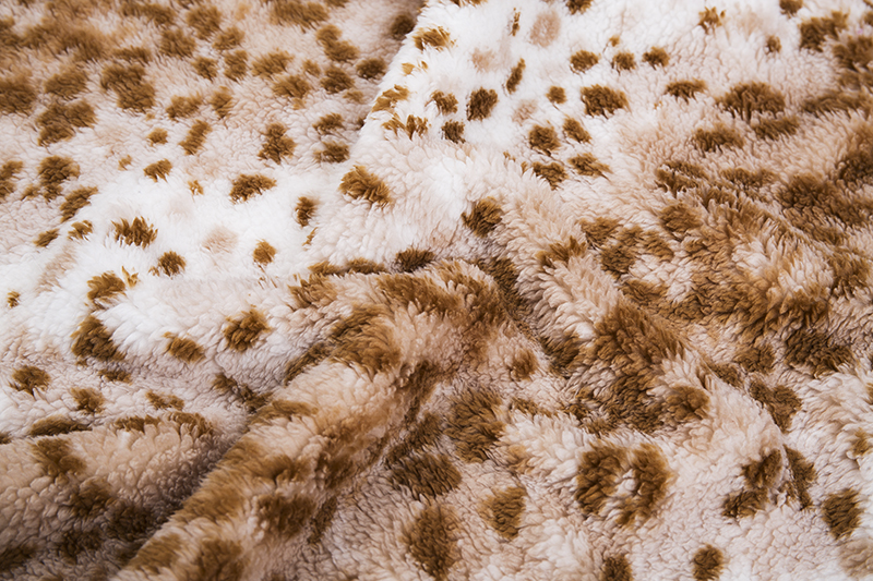 Leopard spot printed sherpa